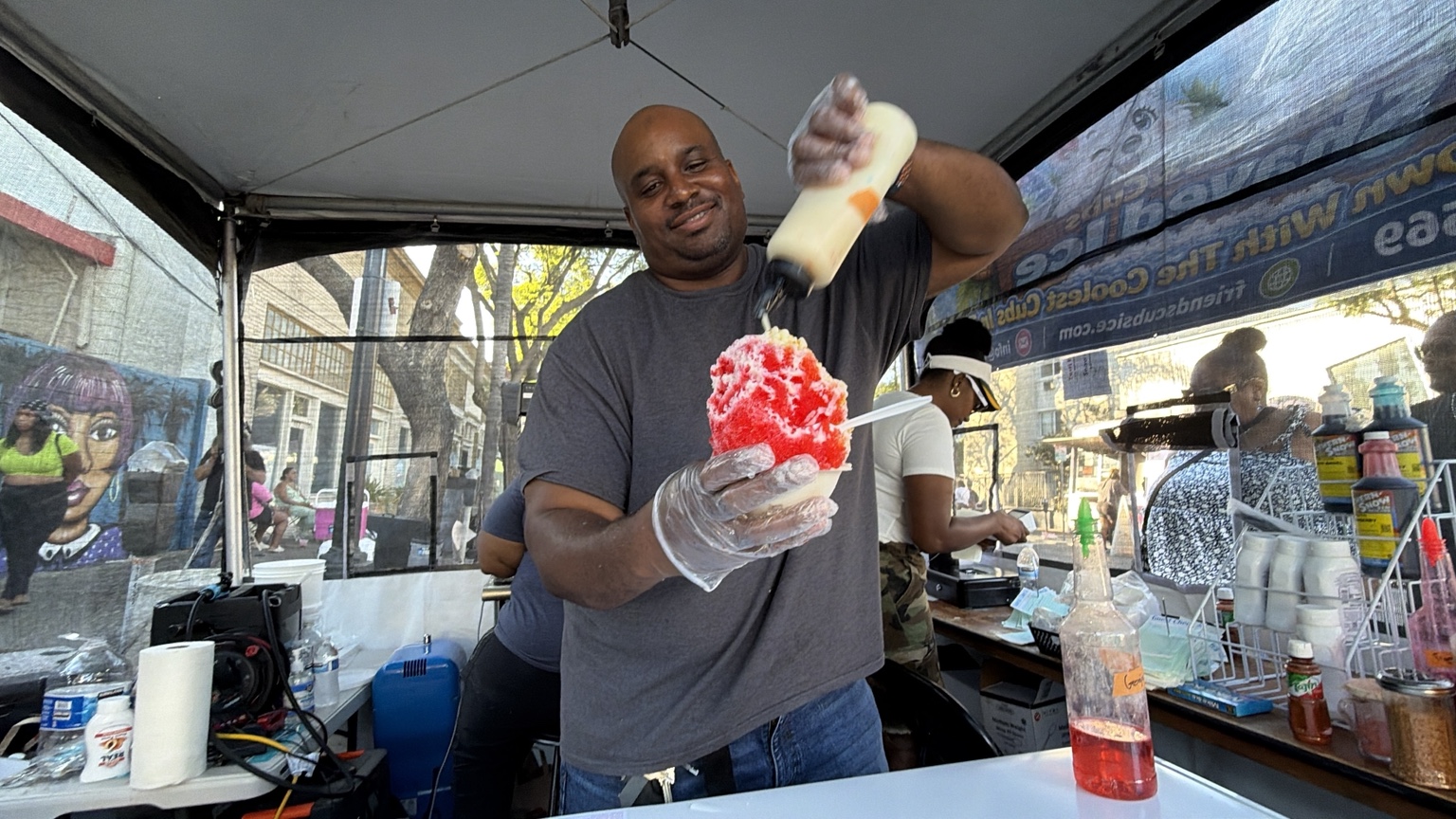 Shaved ice being finished with cream